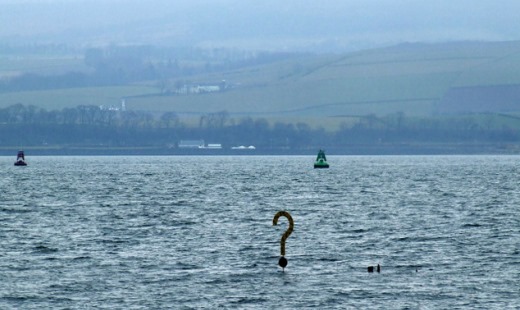 Floating Question Mark on Lake