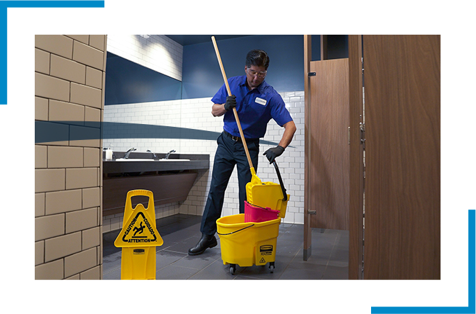 Man cleaning the restroom