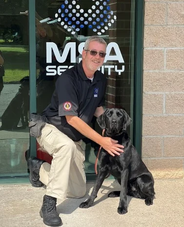 Canine with trainer