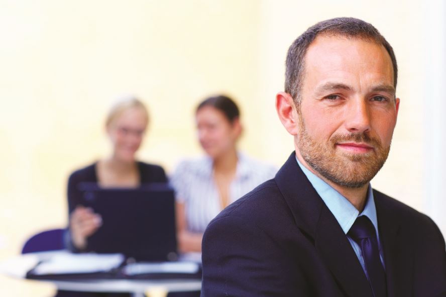 man sitting in meeting