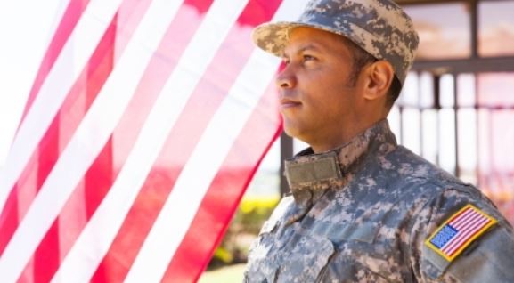 veteran with flag